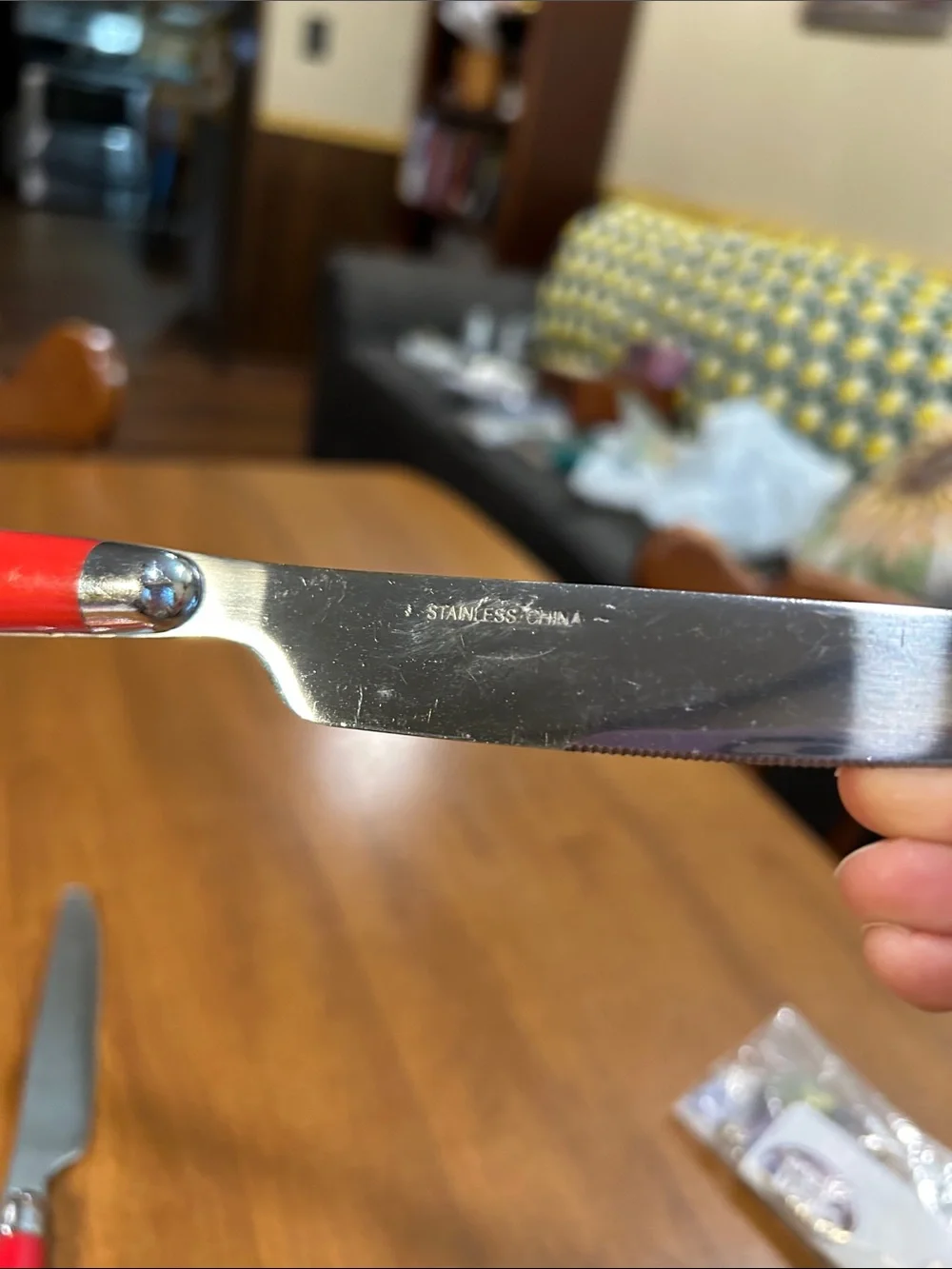 Set of 7 Red Handle Dinner Knives